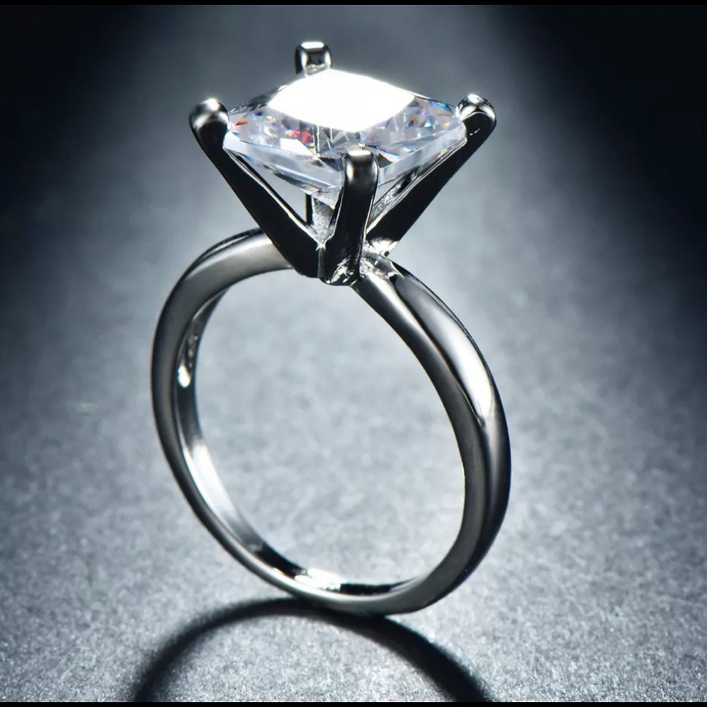 New-Princess cut White Sapphire Size 7 ring